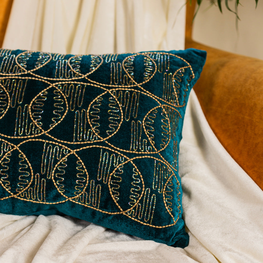 Teal green circles embroidered cushion cover