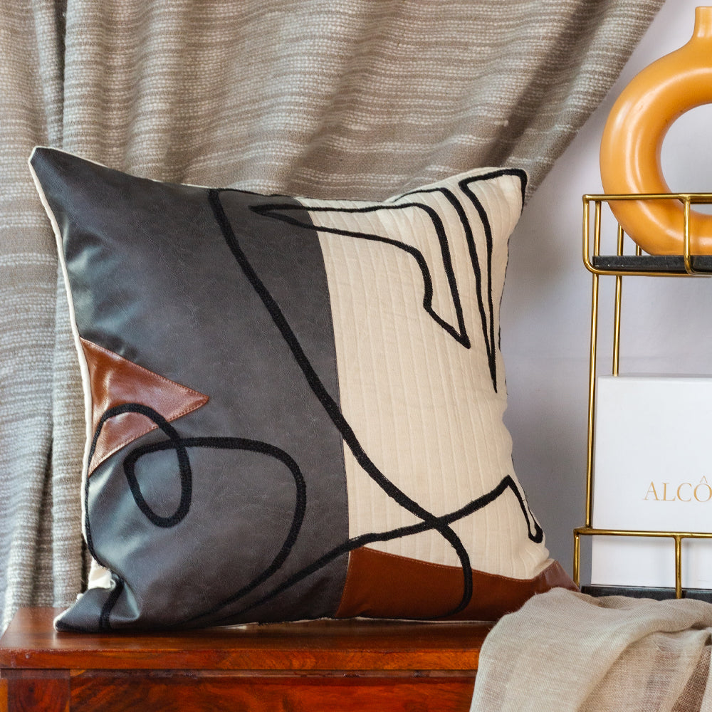 Graphic Embroidered leatherette cushion cover