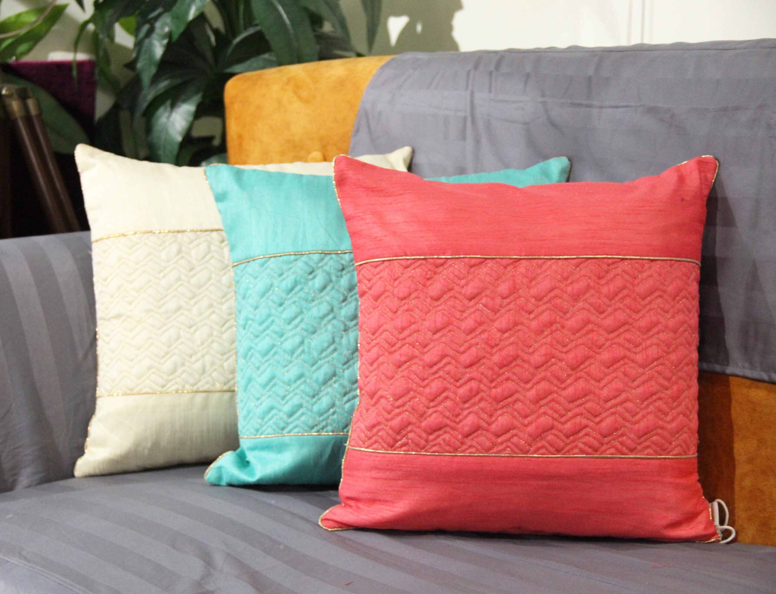 Off white quilted cushion cover