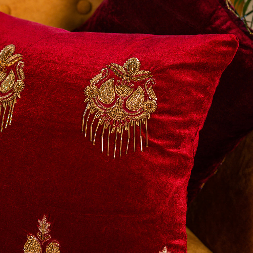 Red aari embroidered cushion cover