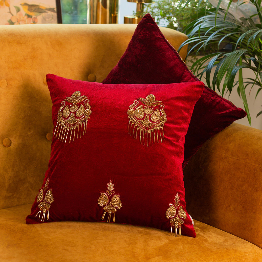Red aari embroidered cushion cover