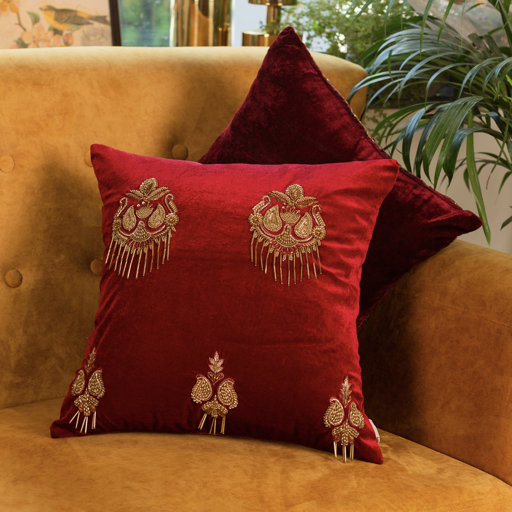 Red aari embroidered cushion cover